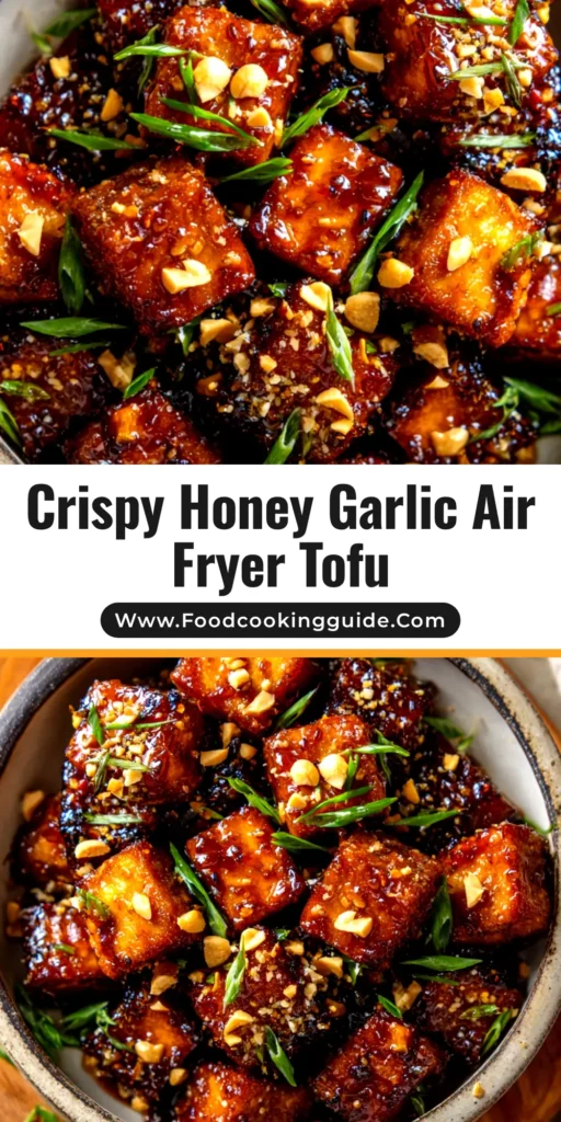 Honey Garlic Air Fryer Tofu: Crispy, Quick & Easy Recipe 3 A close-up shot of crispy Honey Garlic Air Fryer Tofu in a white bowl, garnished with sesame seeds and green onions. The perfect easy and healthy weeknight dinner idea.